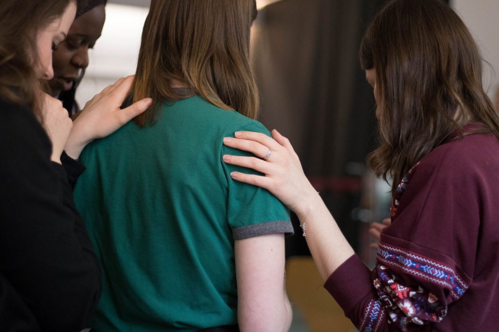 Supporting a friend after a death.