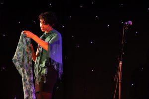 Gabriela Georges performs wearing her mother's scarves, as a way to honour her memory and remain connected.
